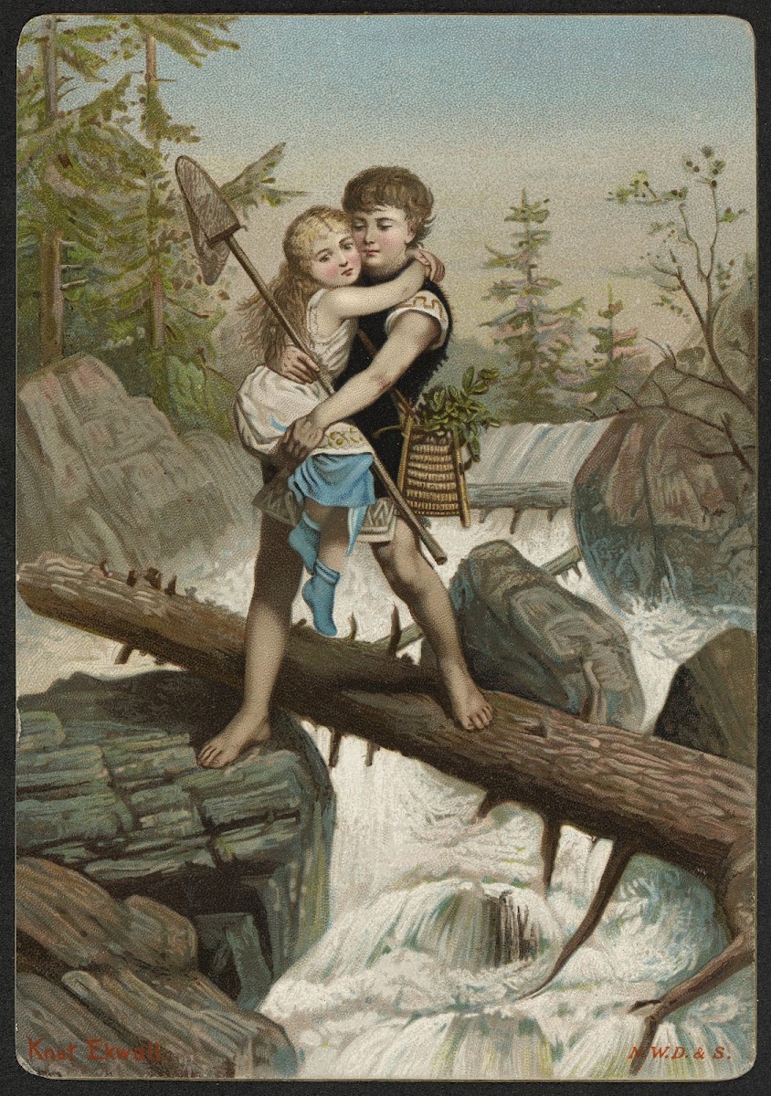 Boy carries girl across river