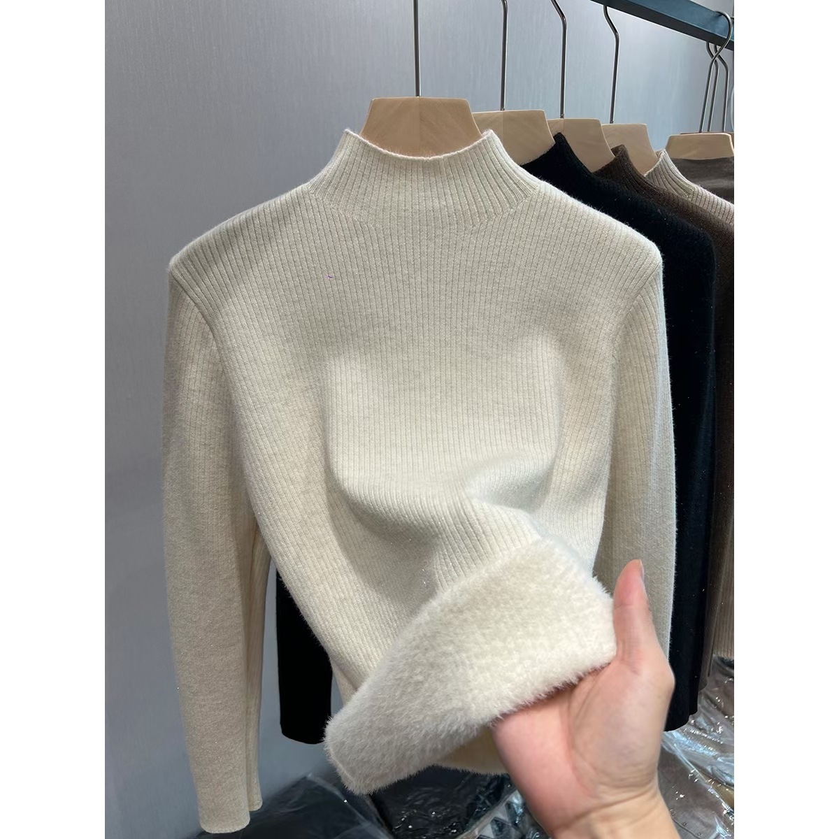 Women's knitted sweater, lined, high collar, warm