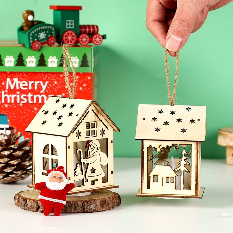 Illuminated wooden house for Christmas