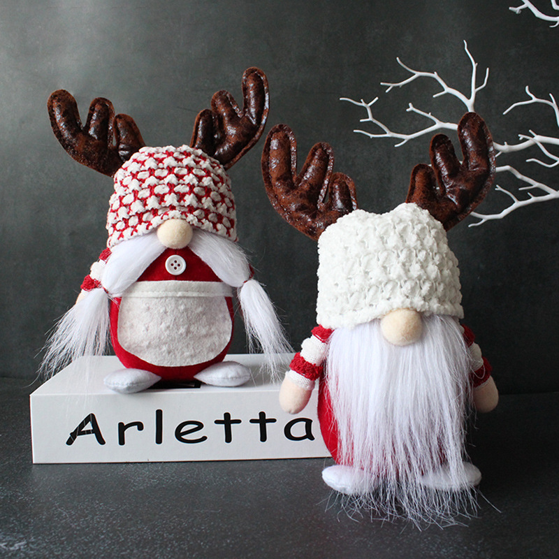 Christmas gnome figure with antler hat, standing