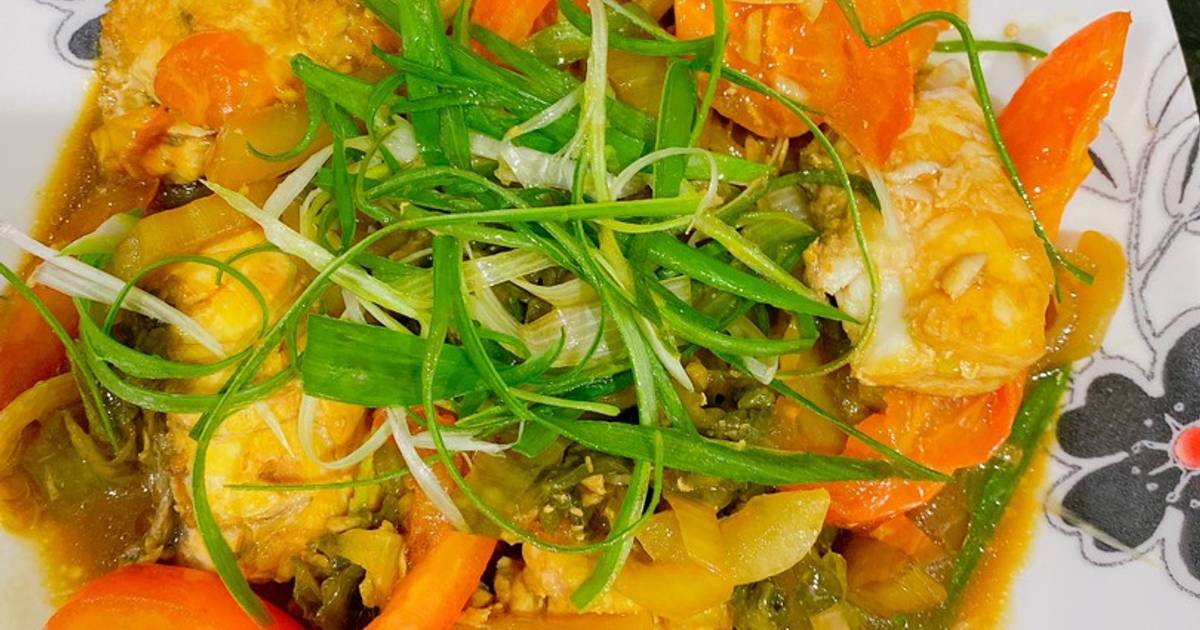 Steam barramundi fillets with pickled mustard and tomatoes