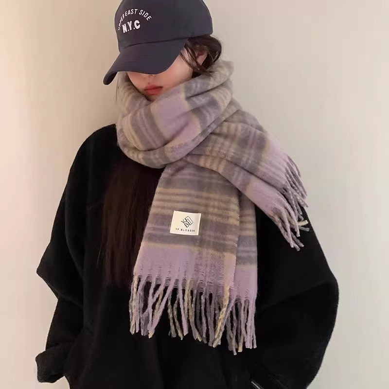 Knitted winter scarf with bear motif