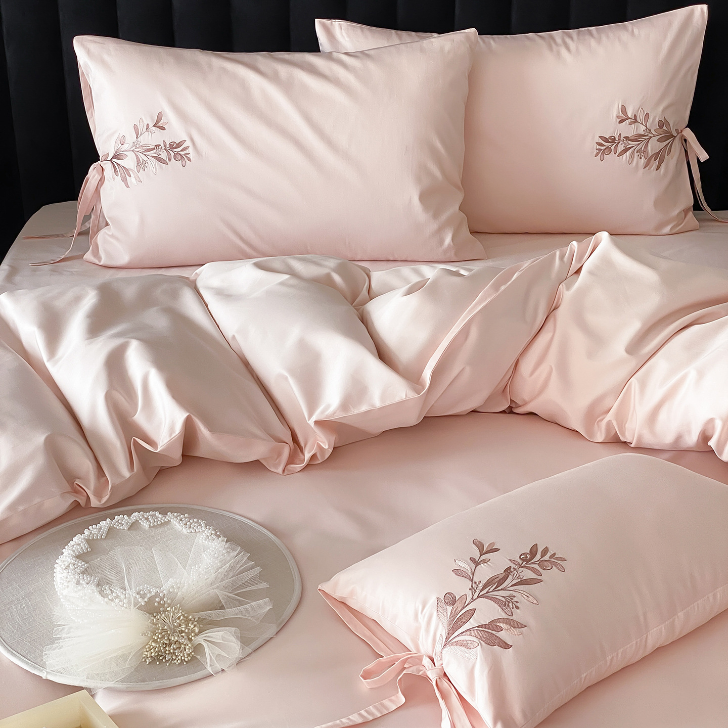Embroidered cotton bedding with floral pattern
