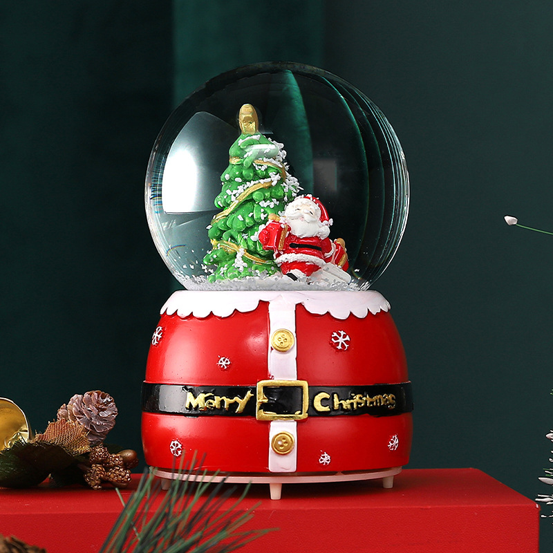 Christmas snow globe with music and light