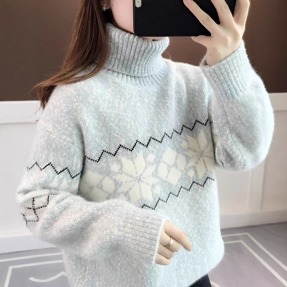 Women's knitted sweater with snowflake pattern and high collar