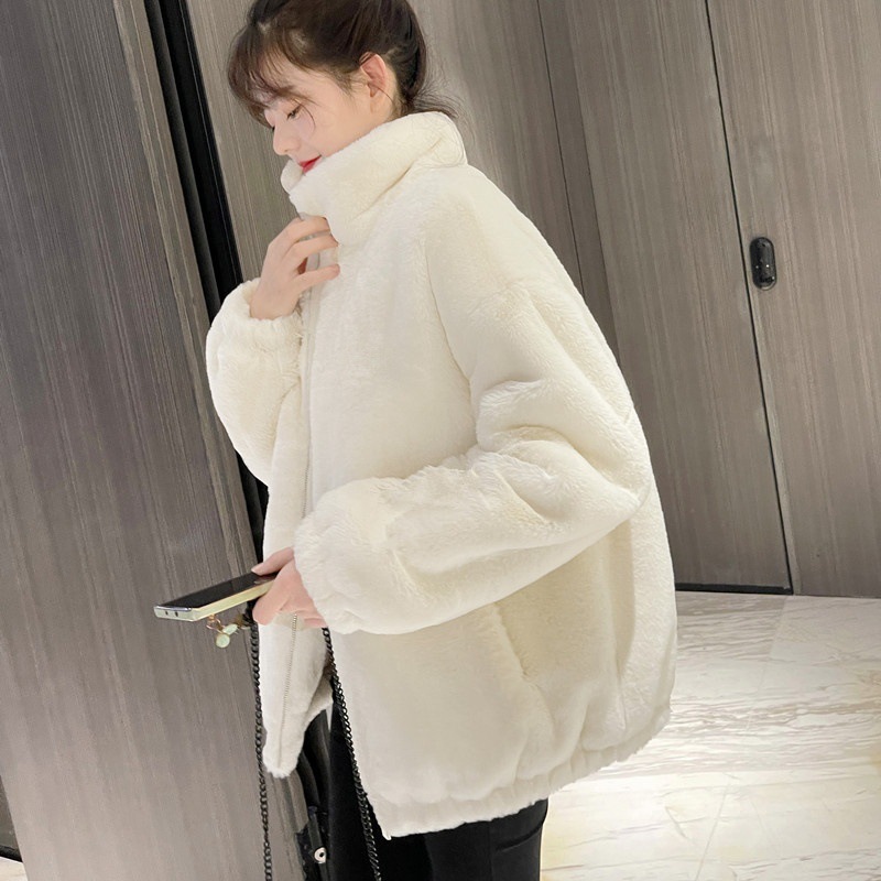 Lamb fleece jacket with stand-up collar and faux fur