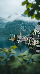 Hallstatt Village on Lake Shore Framed by Misty Mountains