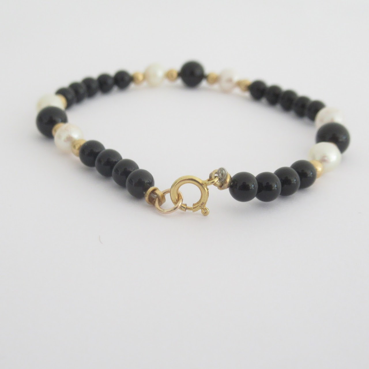 14K Gold, Onyx. and Six Pearl Bracelet