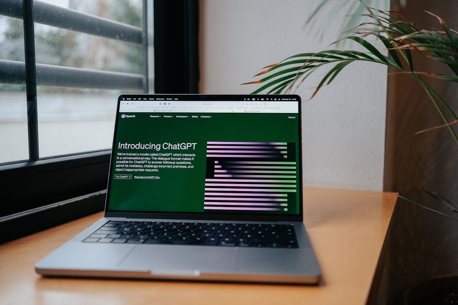 A laptop showing the ChatGPT page