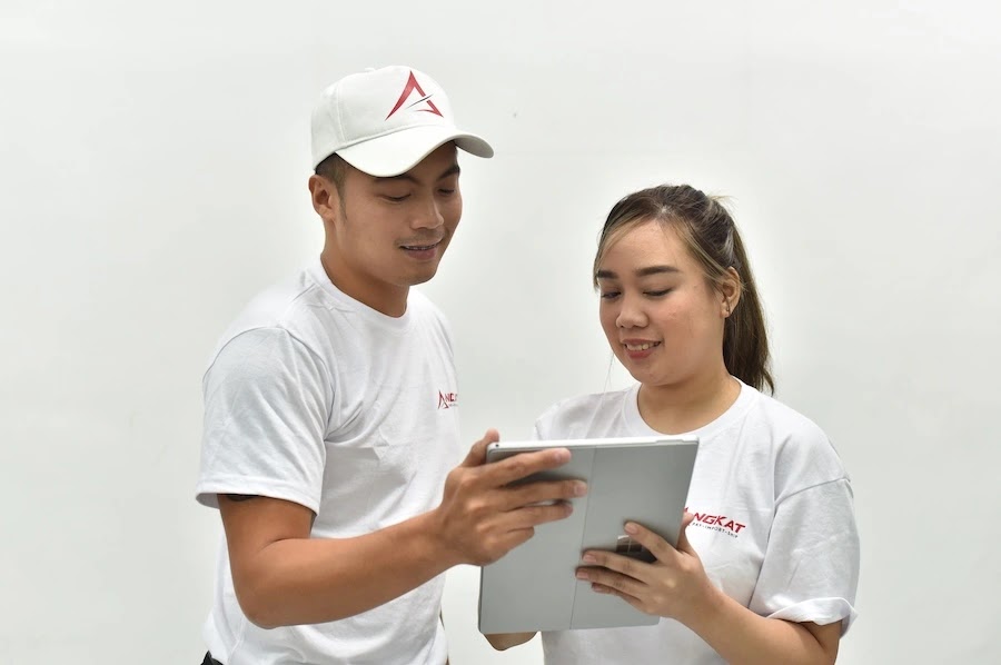 Angkat team reviewing shipments together