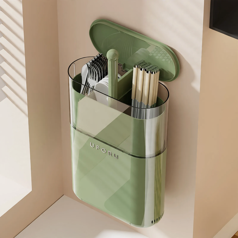 Chopstick holder with push button and drainage