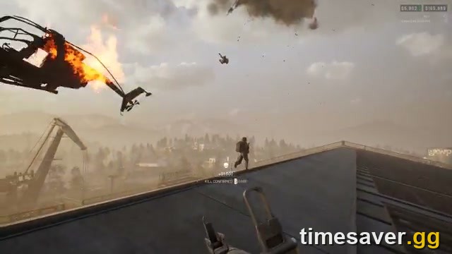 A helicopter explodes mid-air over an industrial WARDOGS battlefield during large-scale combat