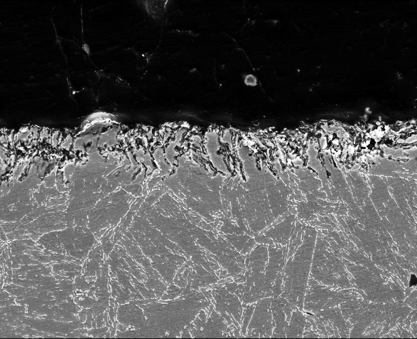 Optimizing microstructure of medium Ni-bearing steel to ensure high resistance to corrosion and corrosion-assisted mechanical degradation