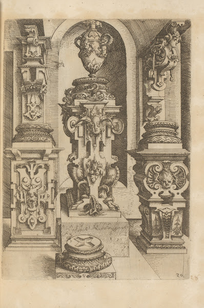 Three Corinthian pedestals decorated with scrollwork and mascarons a Corinthian