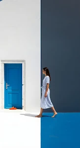 Minimalist Color Block Woman Walking Blue Door