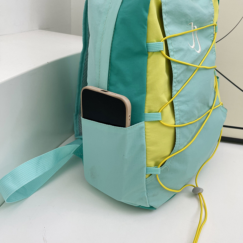 Nylon backpack, 20–35 L, with letter pattern
