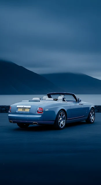 Luxury Blue Convertible Car Against Moody Mountainscape