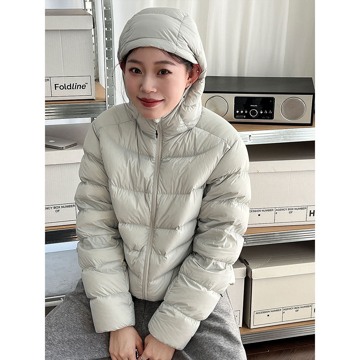 Lightweight women's down jacket with hood, white duck down