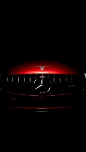Mercedes-AMG Grille and Star Logo in Dramatic Red Light