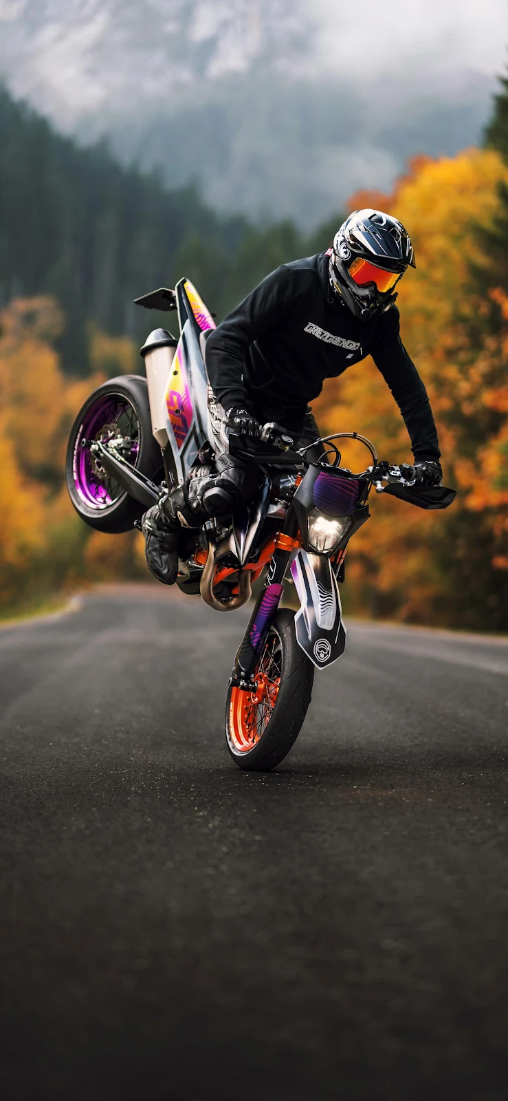 Dynamic Motorcycle Wheelie In Fall - Action Photography 2K iPhone Wallpaper (2050x4440)