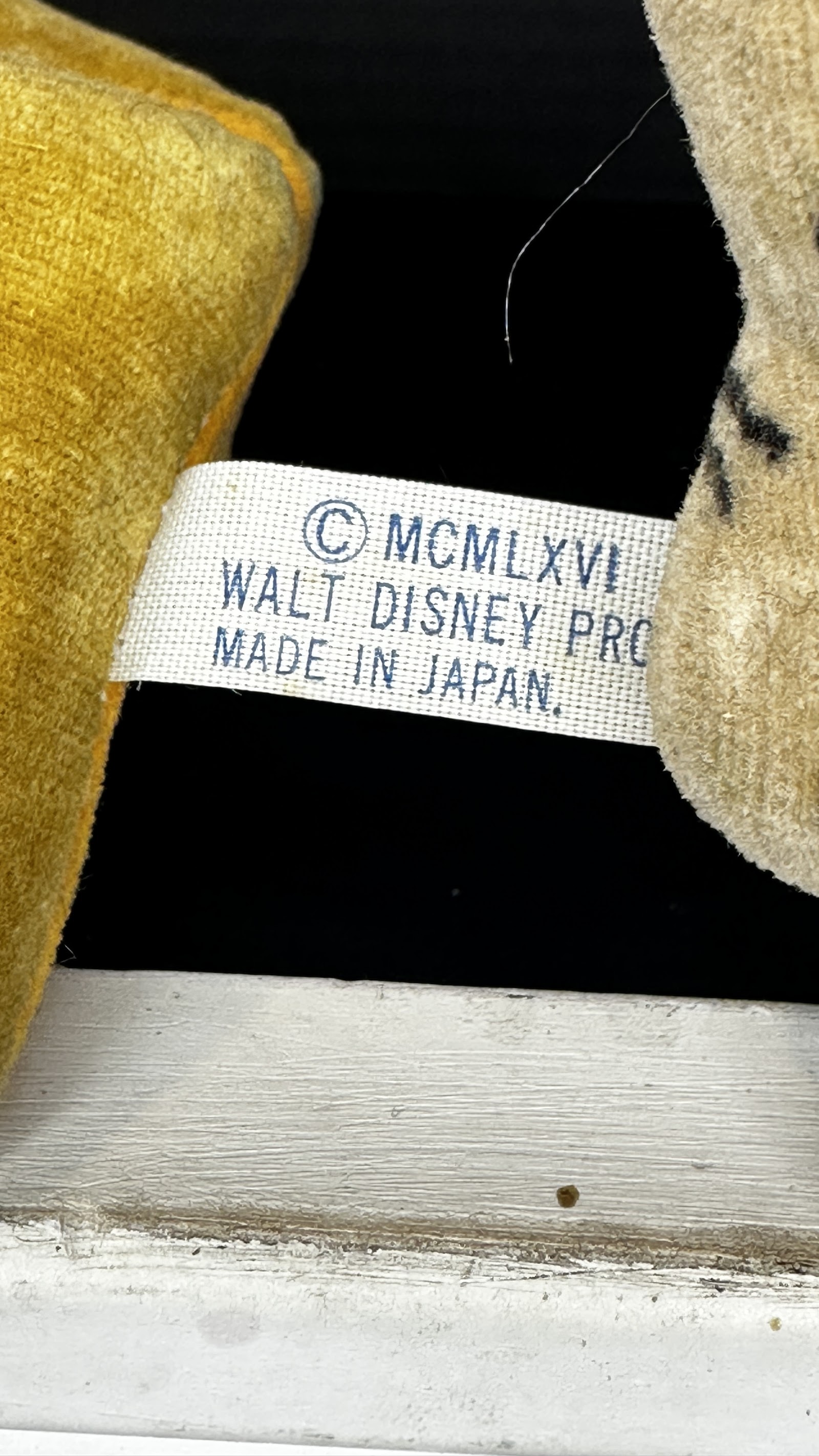 Vintage 1966 Walt Disney Productions plush toy of Winnie the Pooh or Tigger with original MCMLXVI WDP Made in Japan tag