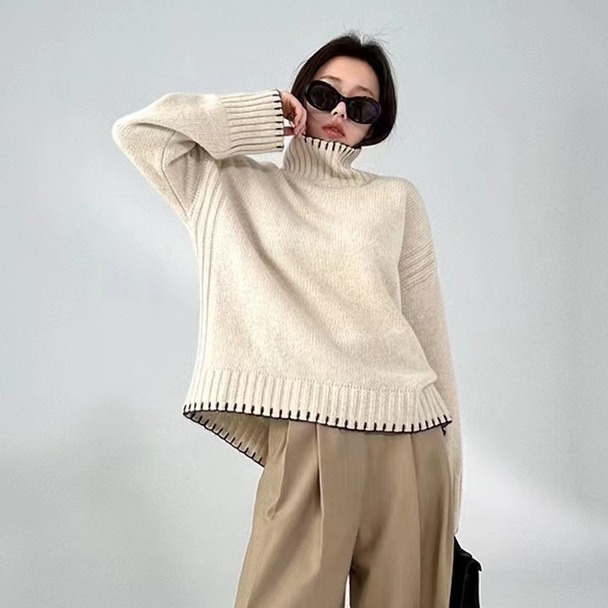 Women's cable-knit sweater with turtleneck