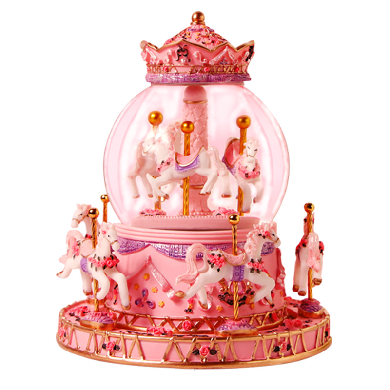 Decorative music box with snow globe and carousel