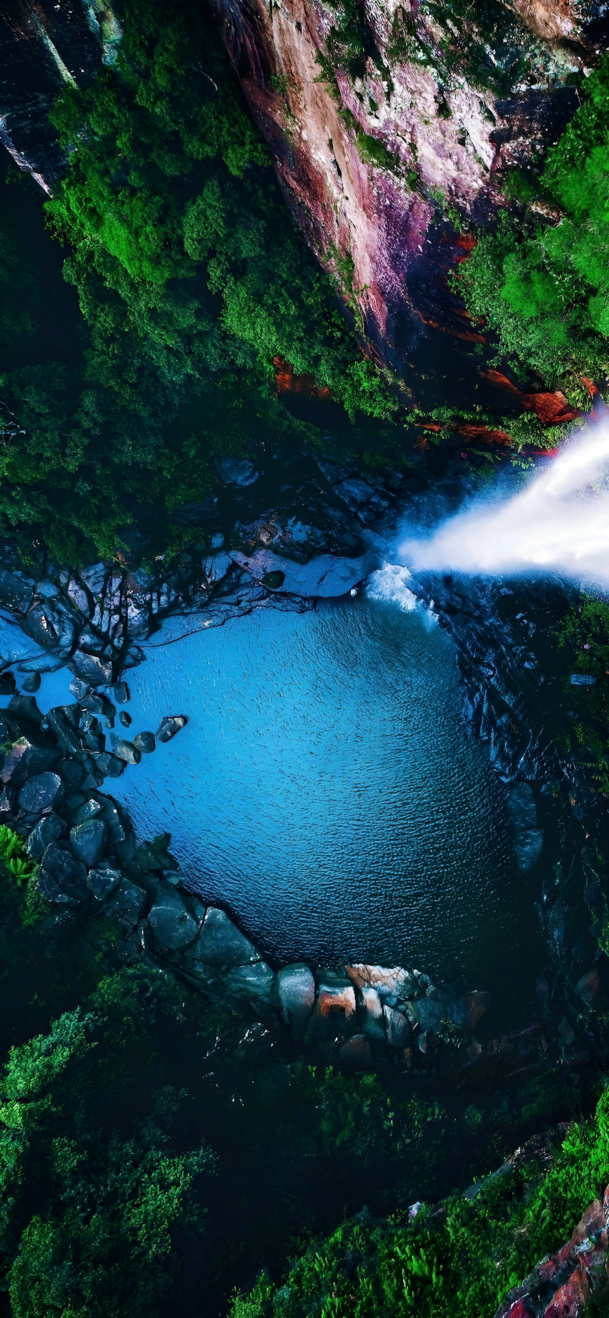 Aerial View of Jungle Waterfall Plunging into Blue Pool - Free 4K mobile Wallpaper