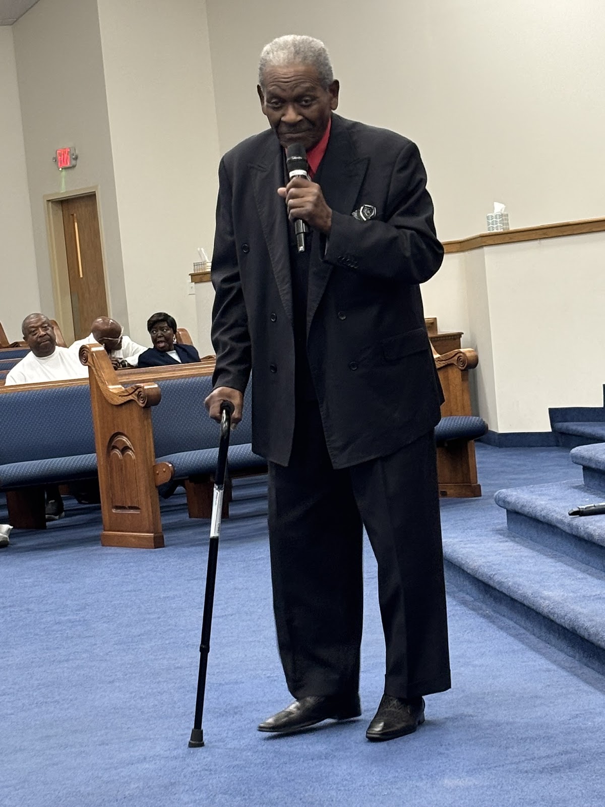 Elder minister speaking at Homecoming 2026 worship service at Sharpe Road Church of Christ Greensboro NC