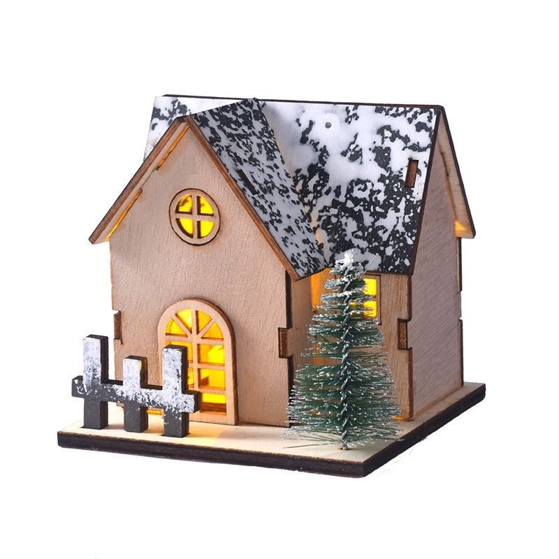 Beleuchtetes Holzhaus für die Weihnachtsdekoration