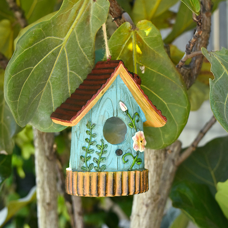 Decorative resin birdhouse for the wall