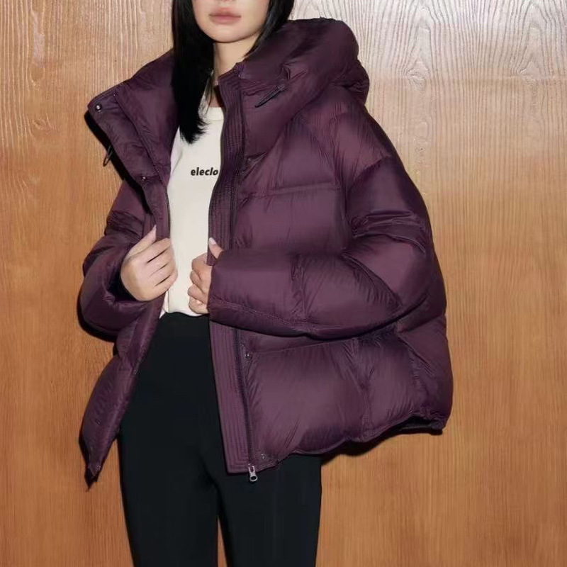 Short women's down jacket with duck down filling