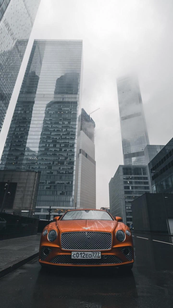 Orange Bentley Continental GT City - Automotive Photography iPhone Wallpaper (720x1280)