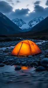 Glowing Tent in Alpine Valley at Twilight