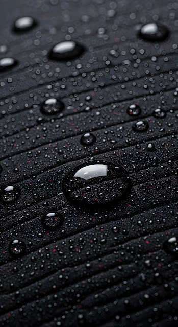 Black Fabric Texture with Reflective Water Droplets Macro - Free mobile Wallpaper