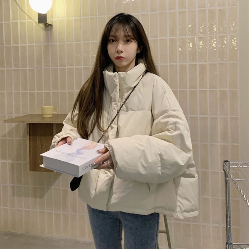 Short, padded women's jacket, loose fit