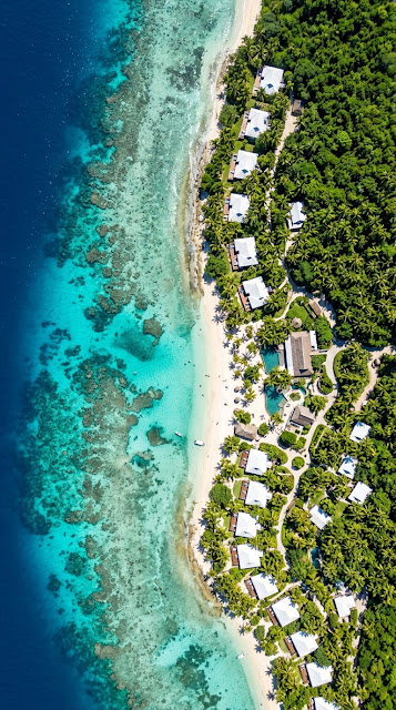 Aerial Drone Photography of a Tropical Coastline with Clear Turquoise Water - Free mobile Wallpaper