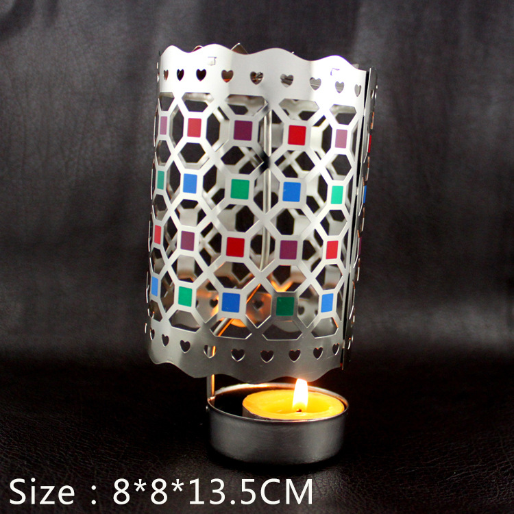 Rotating brass tealight holder, festive design