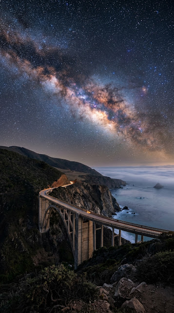 Milky Way Galaxy Over Historic Coastal Arch Bridge At Night - Free mobile Wallpaper