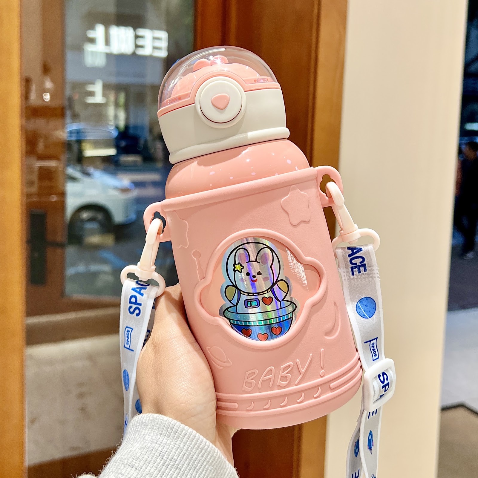 Children's thermos bottle with suction cup and straw