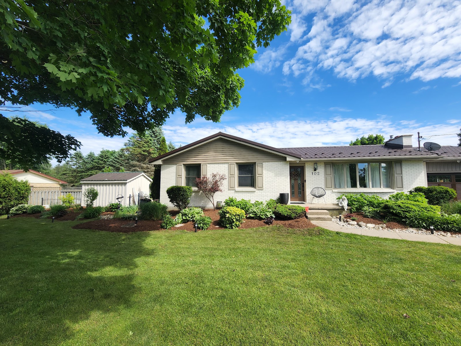 Front yard garden bed redesign and shrub planting in London, Ontario