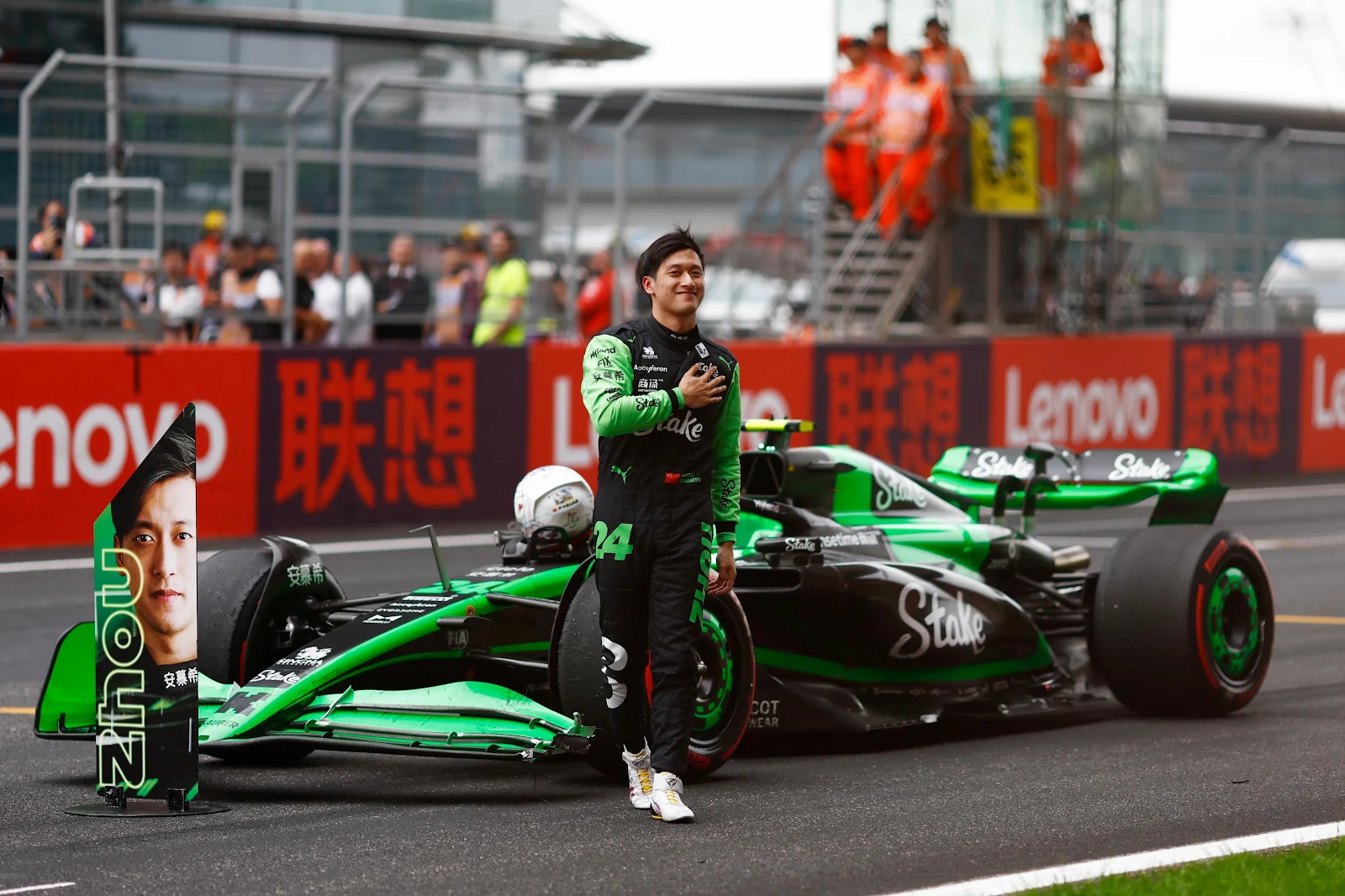 Zhou Guanyu and Stake F1 Car - Sports Photography 4K Wallpaper (4000x2666)