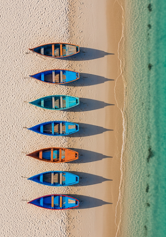 Aerial Beach Rowboats Turquoise Water