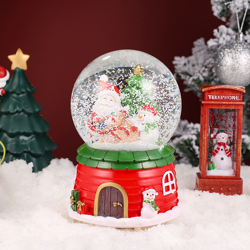 Weihnachtliche Schneekugel mit Musik und Licht