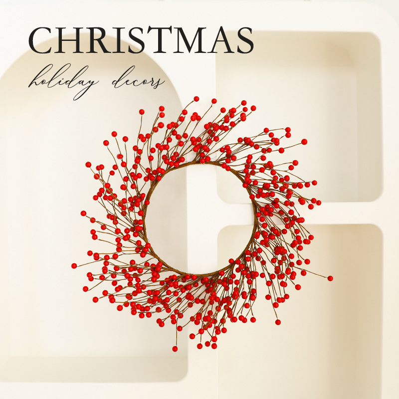 Christmas wreath with berries and pine needles