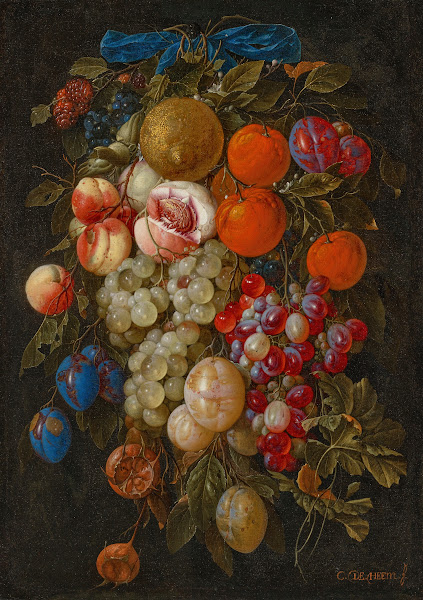 A festoon of fruit hanging from a blue ribbon