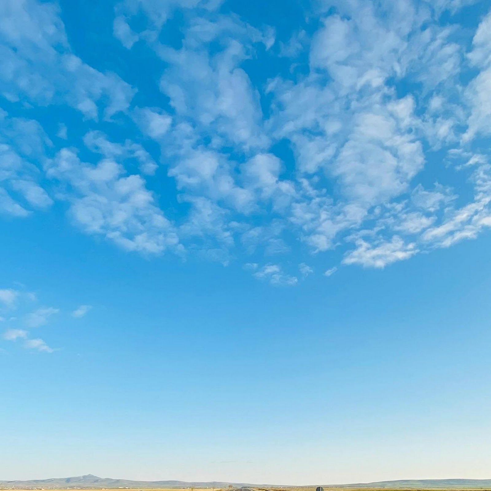 Download Empty Country Road Under Blue Sky Full HD iPhone