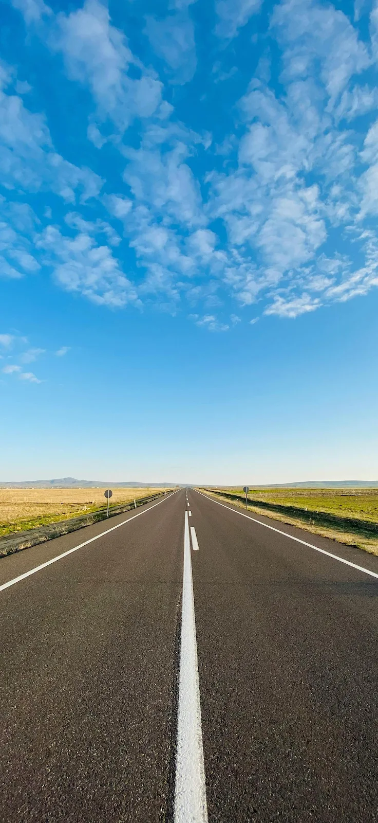 Empty Country Road Under Blue Sky - Landscape Photography Full HD iPhone Wallpaper (1320x2868)