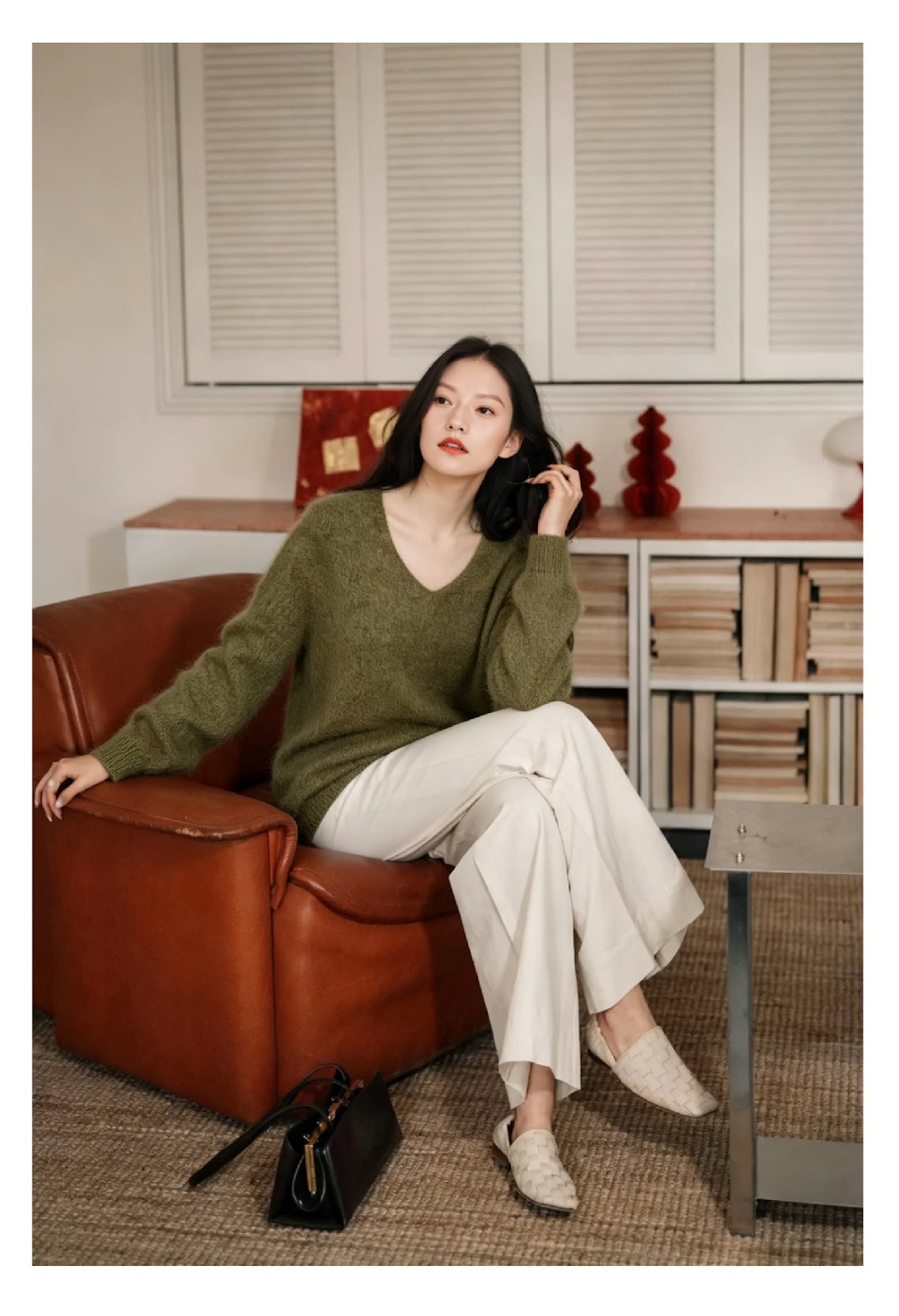 Women's knitted sweater made from a wool blend with a V-neck