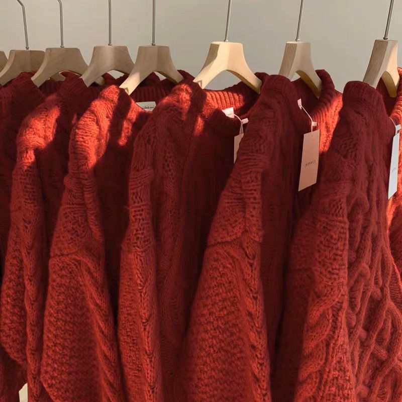 Chunky knitted sweater with cable pattern